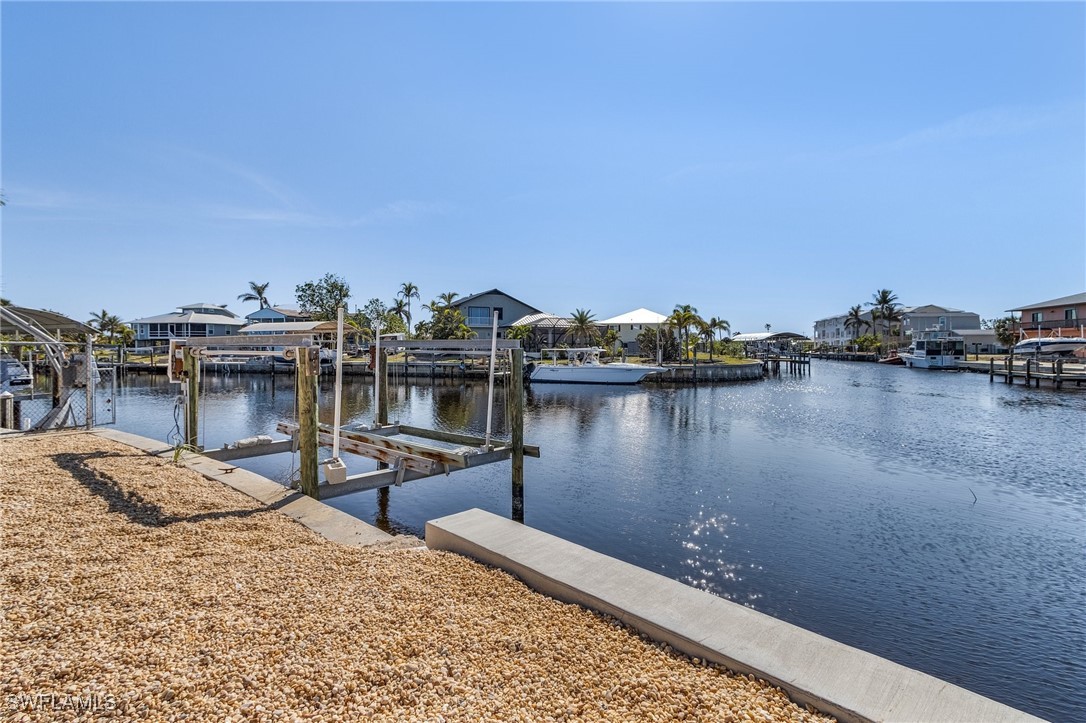 3201-3203 Stabile Road St. James City, FL 33956 - Photo 31 of 34 a view of a lake with boats