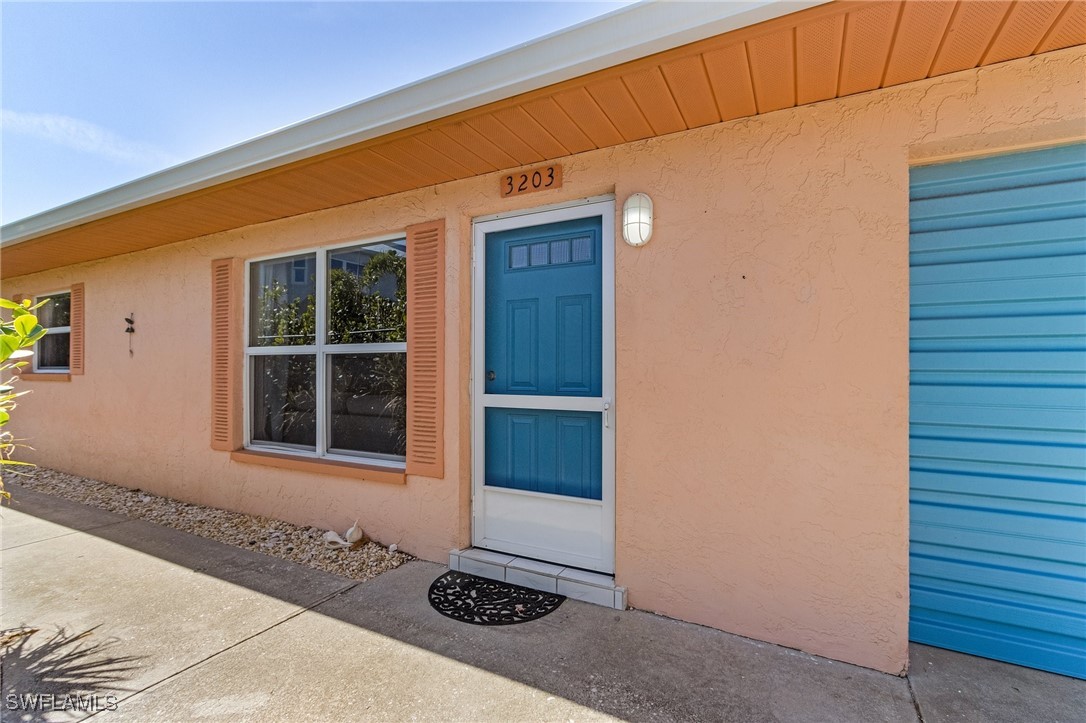 3201-3203 Stabile Road St. James City, FL 33956 - Photo 33 of 34 a front view of a house