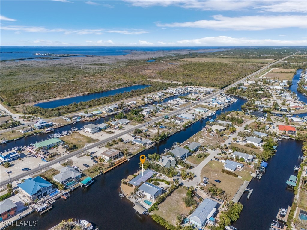 3201-3203 Stabile Road St. James City, FL 33956 - Photo 34 of 34 an aerial view of ocean and residential houses with outdoor space