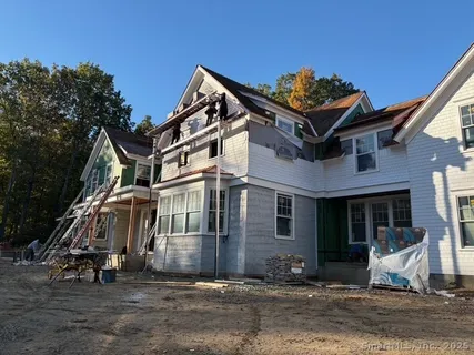 front view of a house with a small yard
