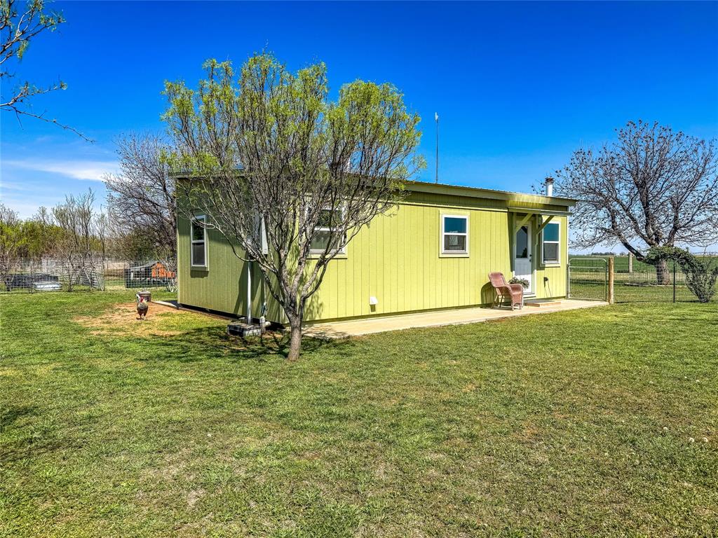 1209 Taylor Avenue Rule, TX 79547 - Photo 14 of 40 a view of a house with a backyard