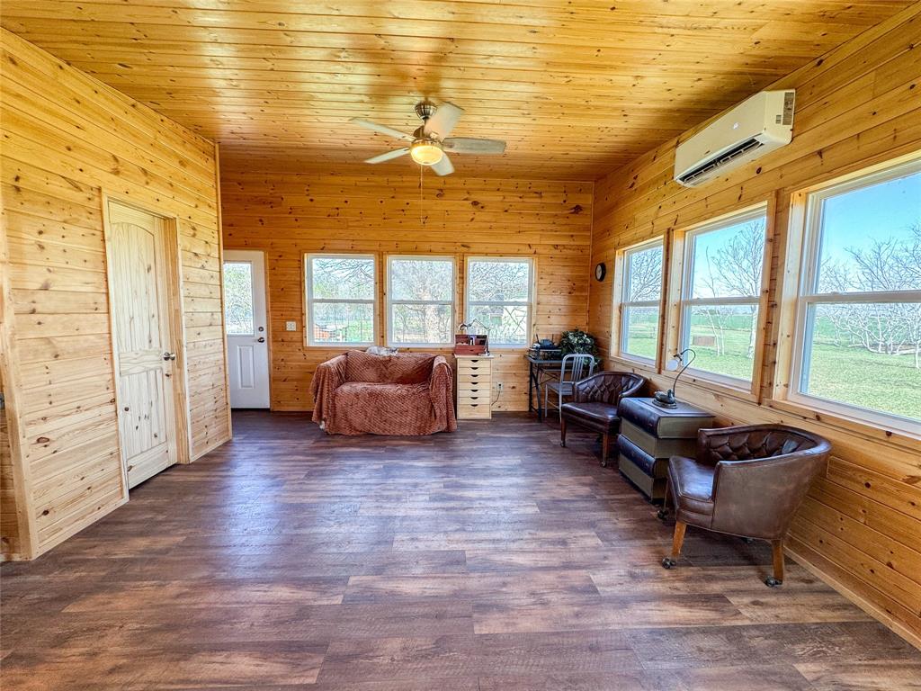 1209 Taylor Avenue Rule, TX 79547 - Photo 2 of 40 a living room with furniture and large windows