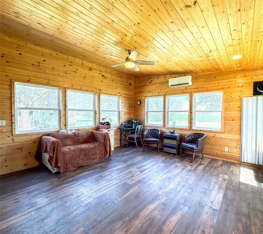 1209 Taylor Avenue Rule, TX 79547 - Photo 4 of 40 a spacious bedroom with a bed and wooden floor