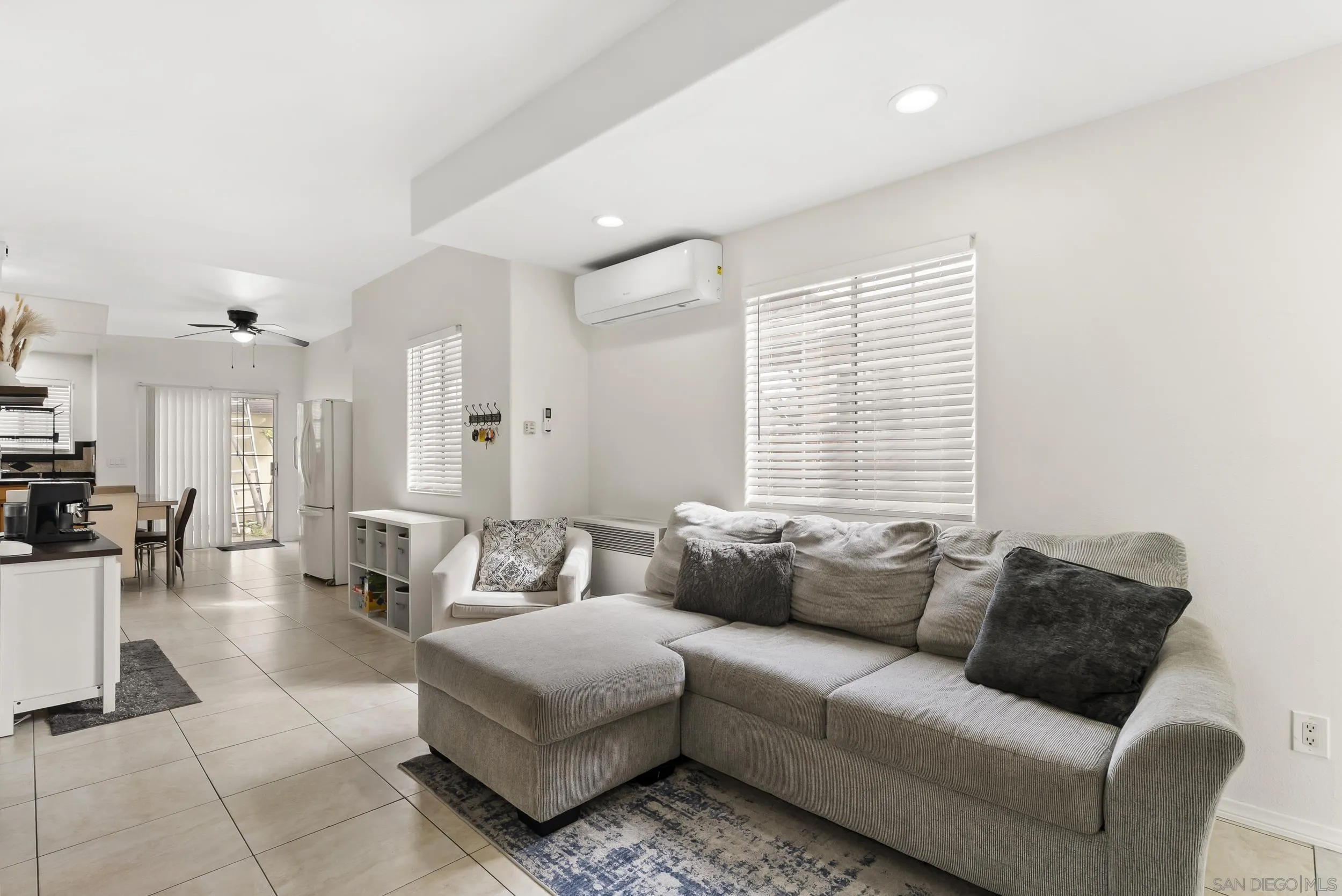 3746 Harding Avenue San Diego, CA 92113 - Photo 11 of 35 a living room with furniture and a large window