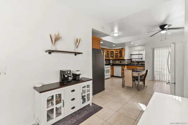 a kitchen with stainless steel appliances a refrigerator and cabinets