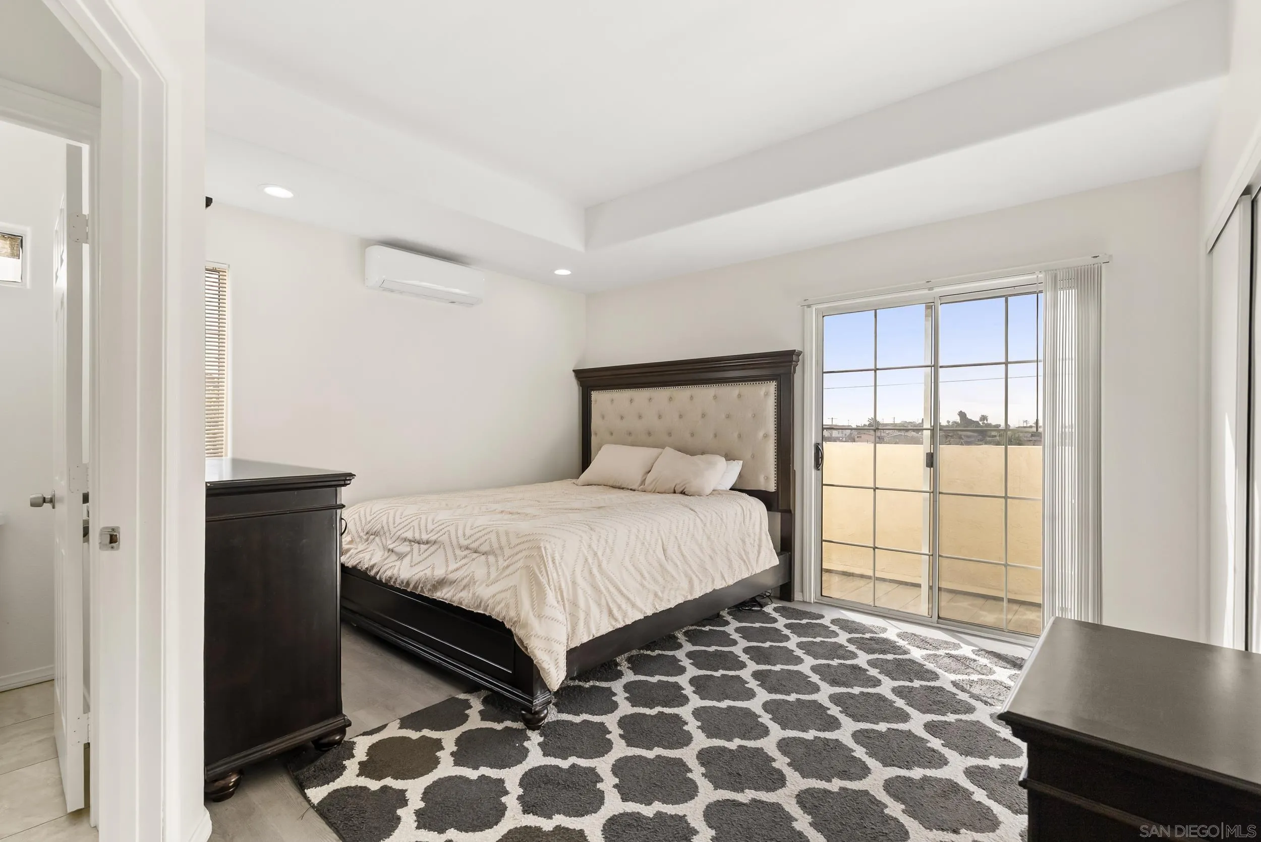 3746 Harding Avenue San Diego, CA 92113 - Photo 20 of 35 a bedroom with a bed and a window