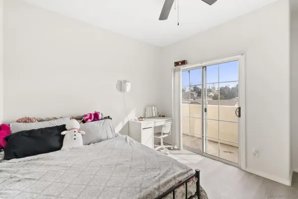 a bedroom with a bed and a cabinets