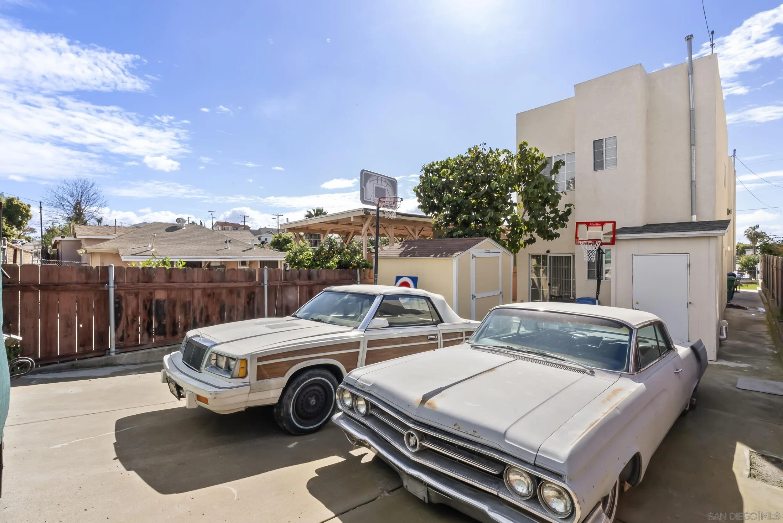 3746 Harding Avenue San Diego, CA 92113 - Photo 35 of 35 a car parked in front of a house