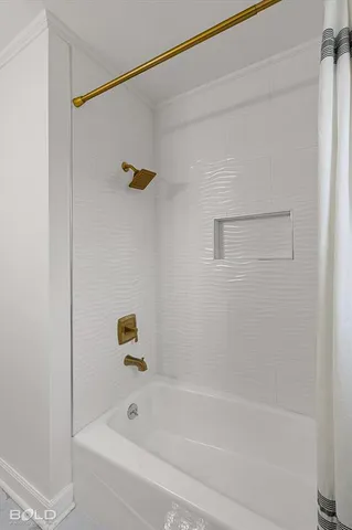 a bathroom with a bathtub