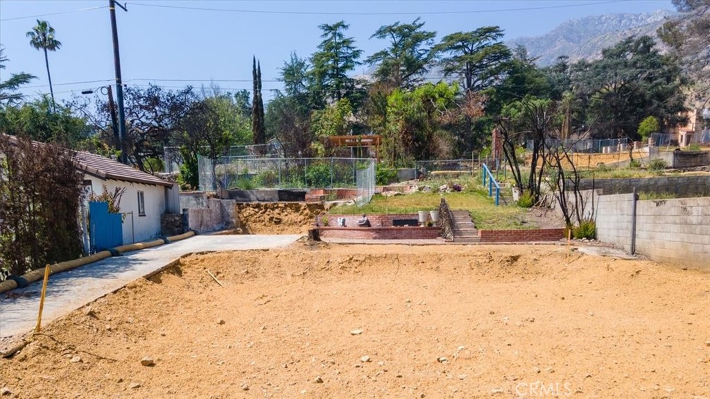 999 Wapello Street Altadena, CA 91001 - Photo 14 of 16 a view of a swimming pool with a patio