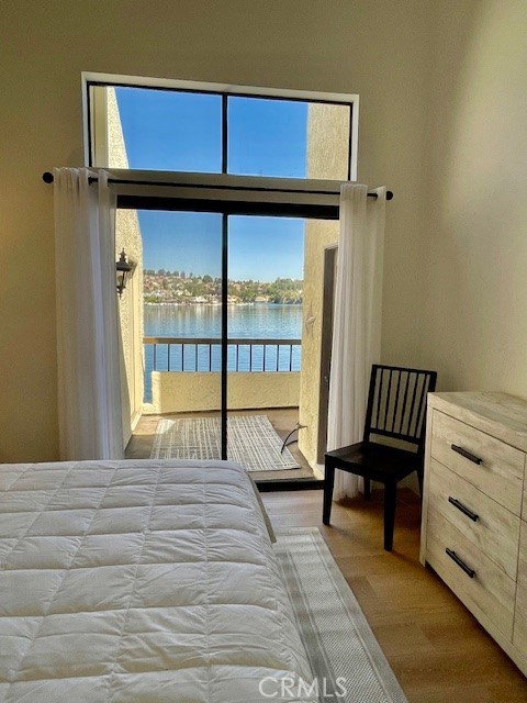 27793 Rota, Unit 14 Mission Viejo, CA 92692 - Photo 14 of 18 a view of a bedroom with furniture and a window