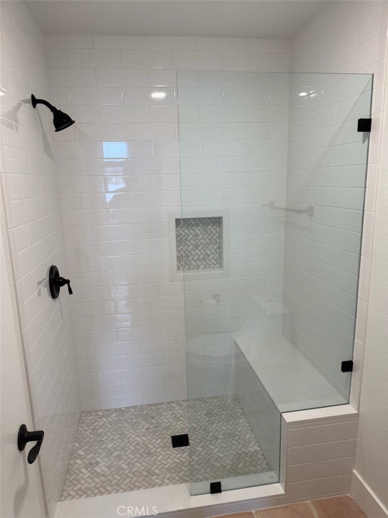 27793 Rota, Unit 14 Mission Viejo, CA 92692 - Photo 18 of 18 a bathroom with a shower