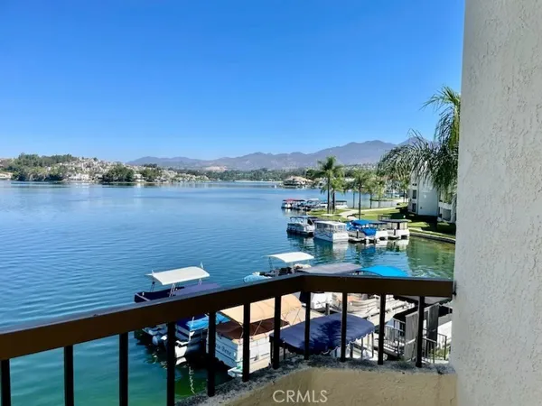 a view of a lake from a balcony