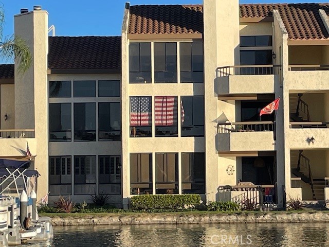 27793 Rota, Unit 14 Mission Viejo, CA 92692 - Photo 6 of 18 a front view of building with a windows