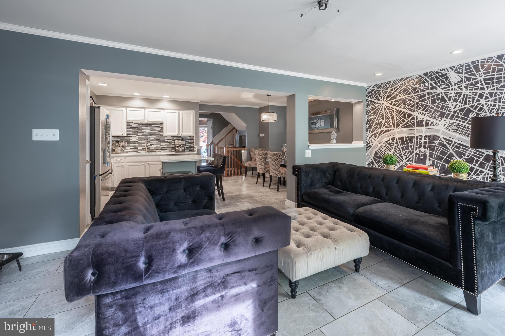166 Liberty Way Deptford, NJ 08096 - Photo 11 of 25 a living room with furniture and a fireplace