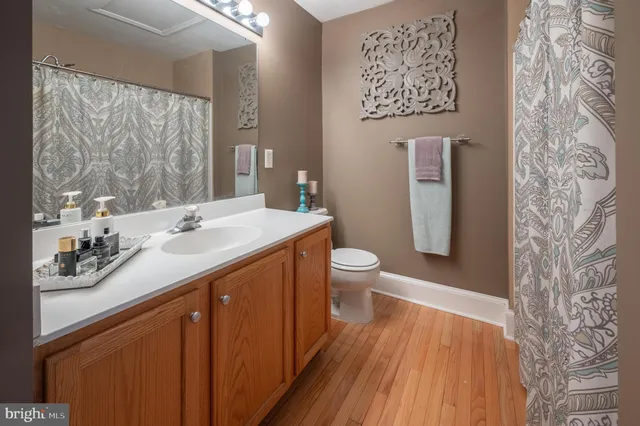 a bathroom with a sink and a large mirror
