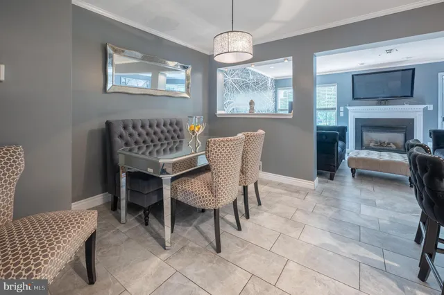 a view of a livingroom with furniture and a chandelier
