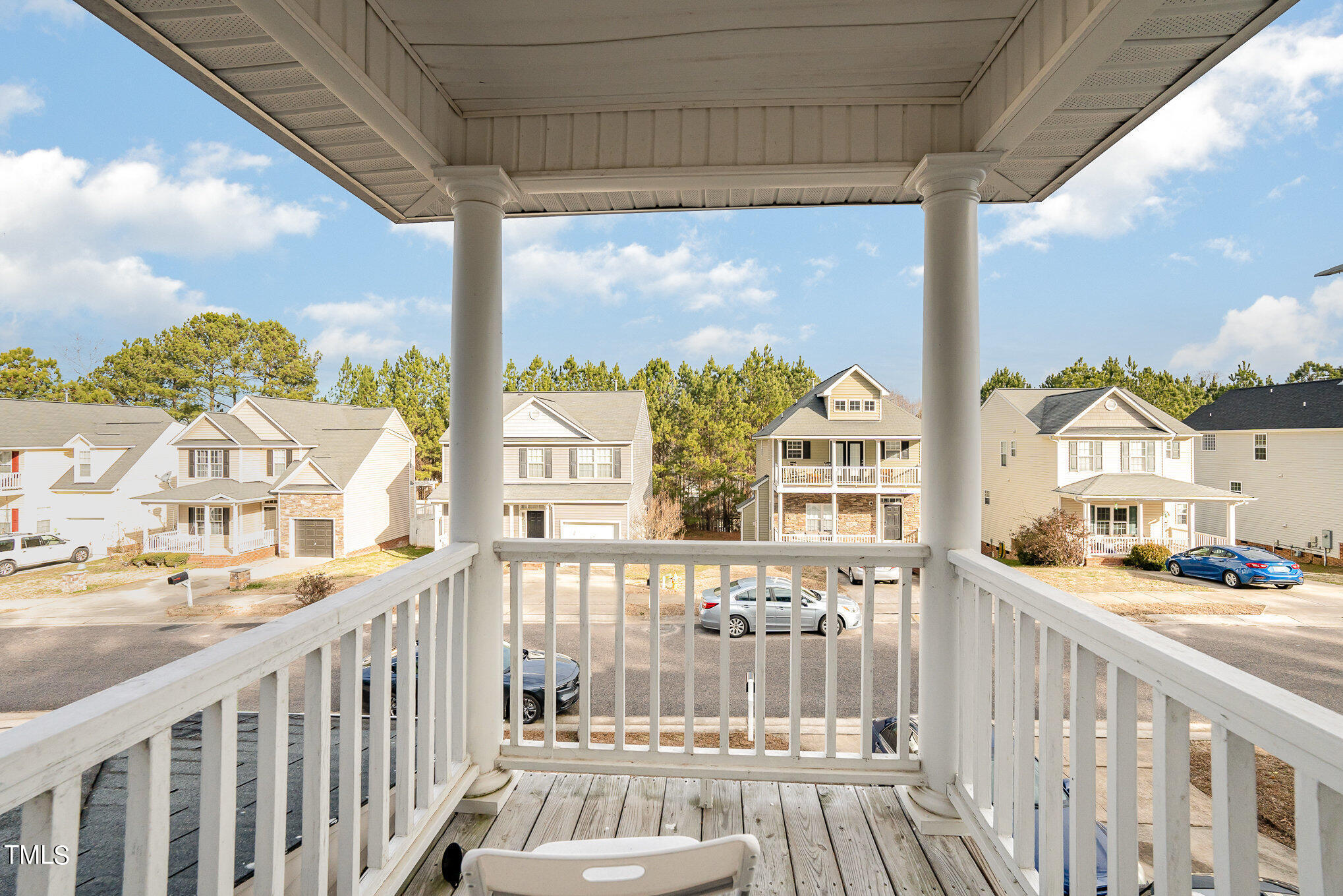 5828 Wynmore Road Raleigh, NC 27610 - Photo 17 of 19 a view of a city from a balcony