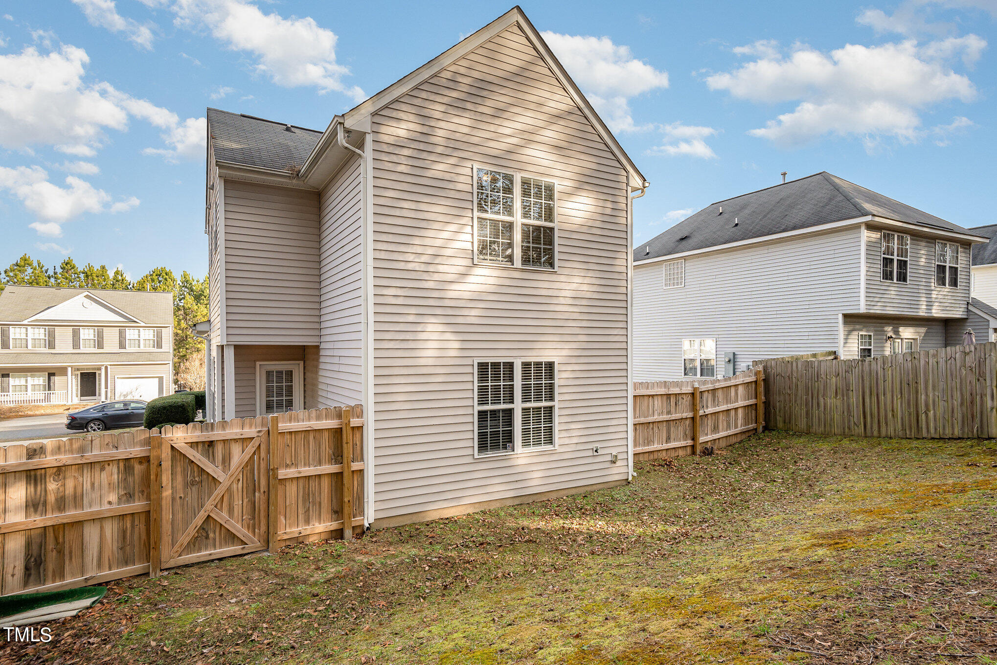 5828 Wynmore Road Raleigh, NC 27610 - Photo 3 of 19 a view of a house with a yard