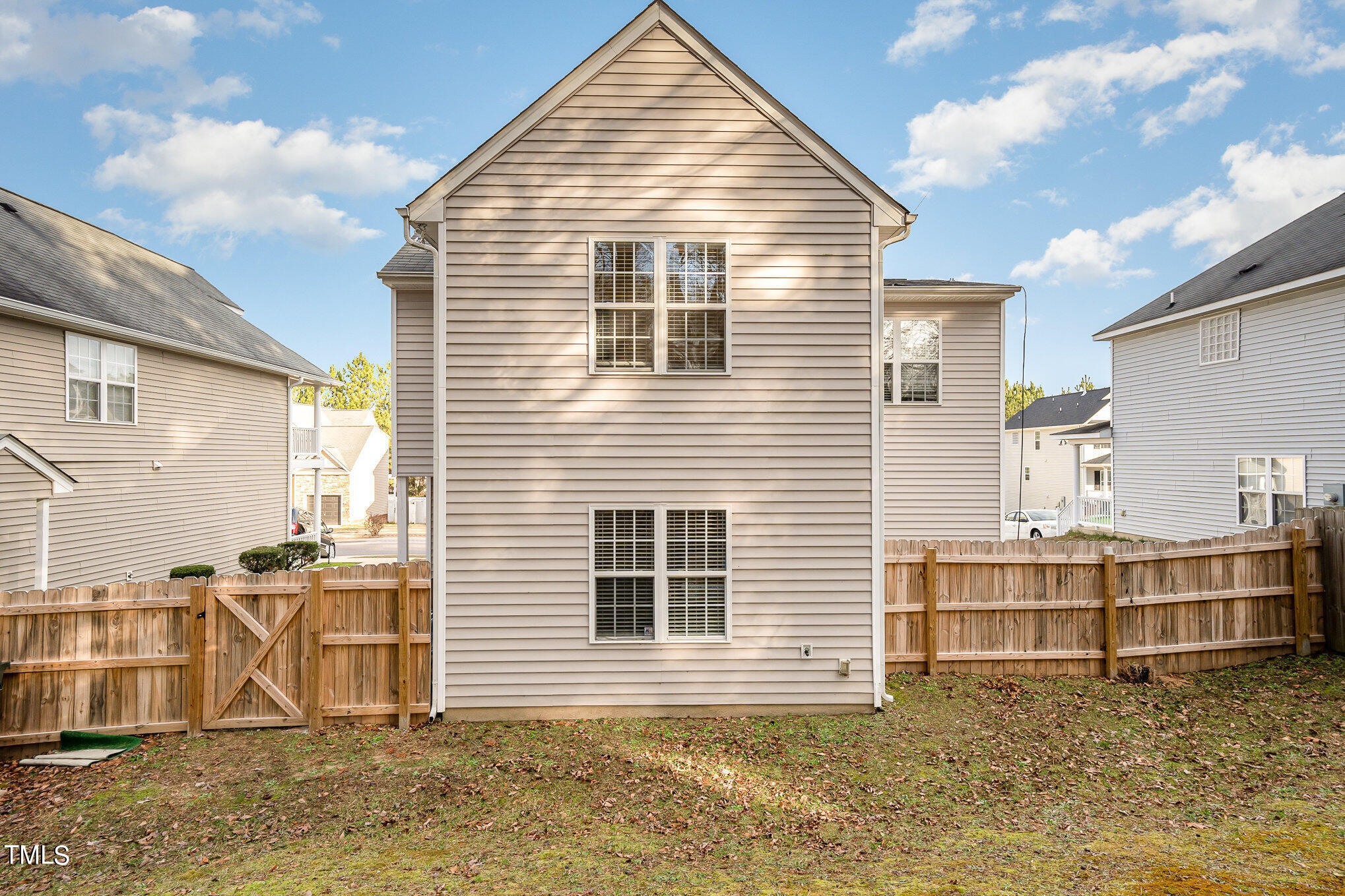 5828 Wynmore Road Raleigh, NC 27610 - Photo 4 of 19 a view of a house with a balcony