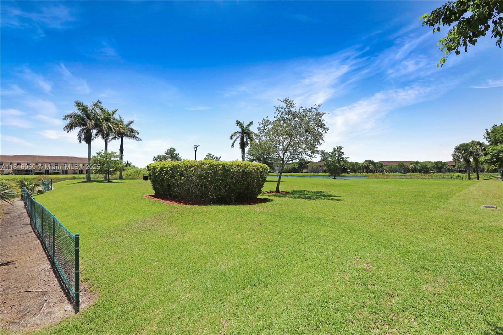 1585 Southeast 20th Road Homestead, FL 33035 - Photo 13 of 26 a view of a house with a big yard
