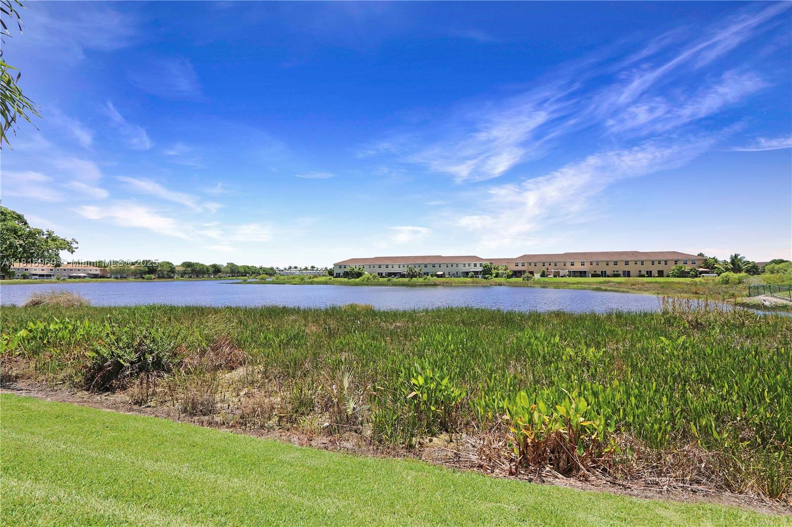 1585 Southeast 20th Road Homestead, FL 33035 - Photo 14 of 26 a view of a city and a lake view
