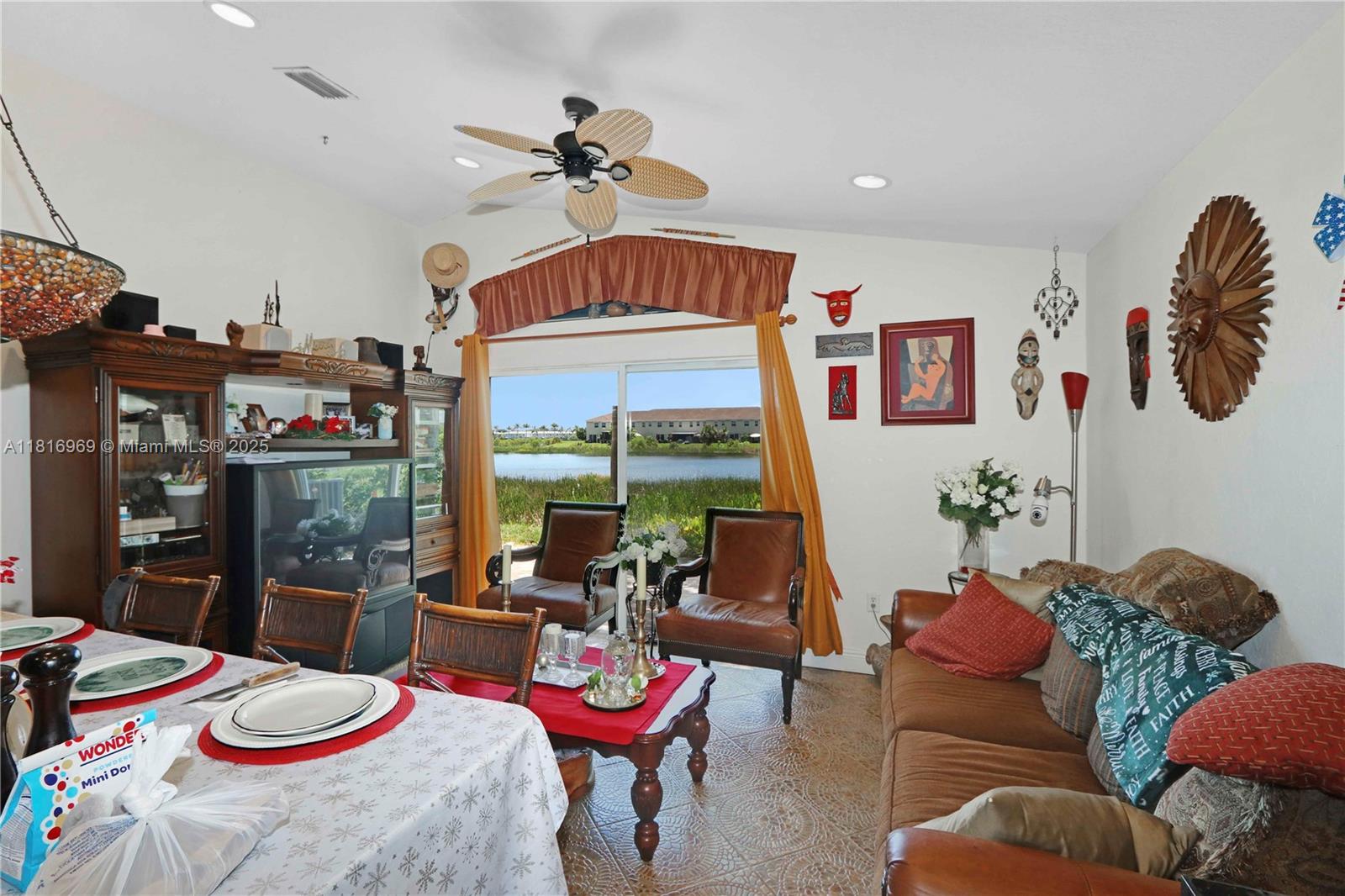1585 Southeast 20th Road Homestead, FL 33035 - Photo 5 of 26 a living room with furniture and a window