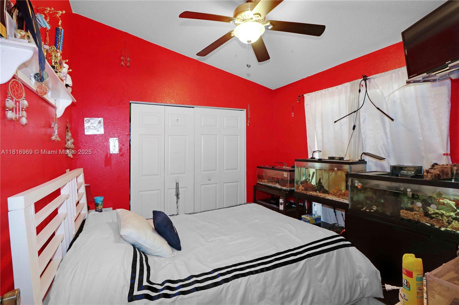 1585 Southeast 20th Road Homestead, FL 33035 - Photo 9 of 26 a kitchen with stainless steel appliances kitchen island a stove a sink and a refrigerator