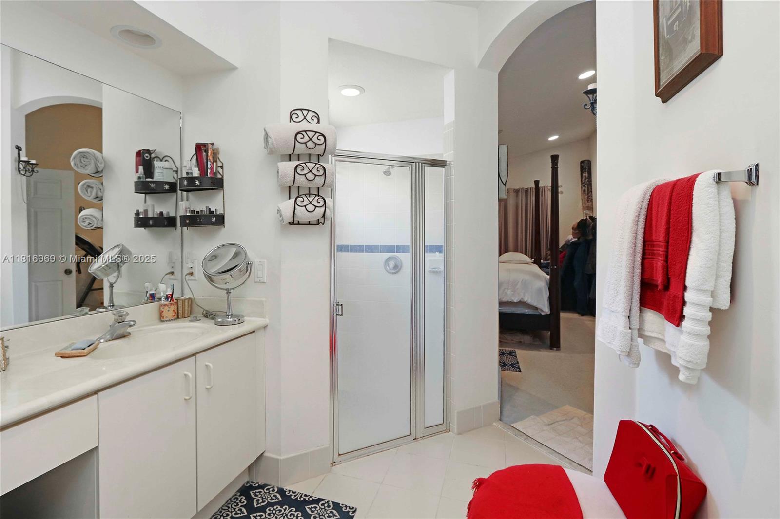 1585 Southeast 20th Road Homestead, FL 33035 - Photo 10 of 26 a bathroom with a sink vanity and a shower