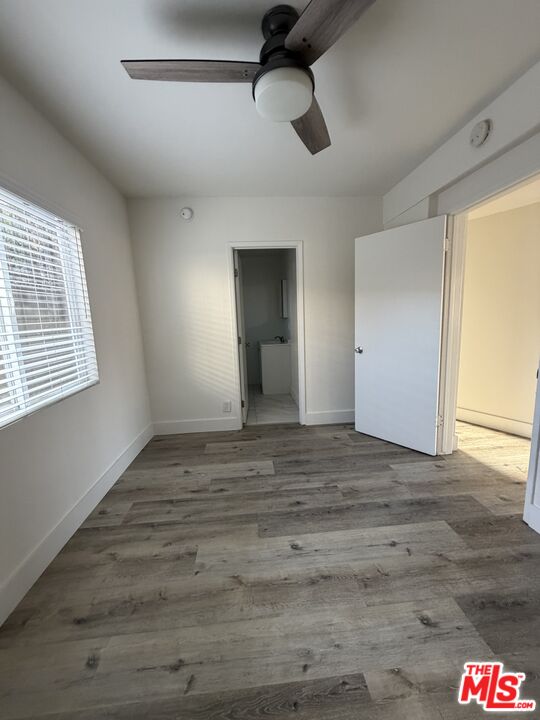 1850 West 145th Street, Unit A Gardena, CA 90249 - Photo 11 of 16 a view of an empty room and window