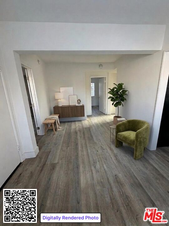 1850 West 145th Street, Unit A Gardena, CA 90249 - Photo 2 of 16 a living room with furniture and a wooden floor
