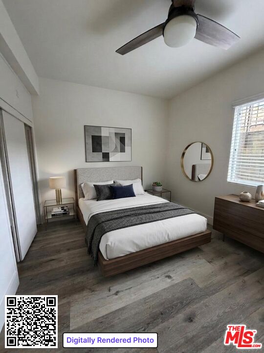 1850 West 145th Street, Unit A Gardena, CA 90249 - Photo 4 of 16 a bedroom with a bed and a chandelier