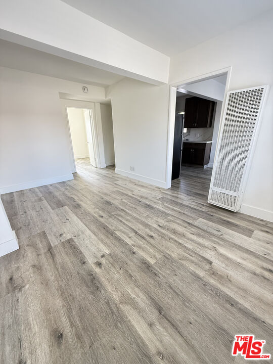 1850 West 145th Street, Unit A Gardena, CA 90249 - Photo 6 of 16 a view of an empty room with a window