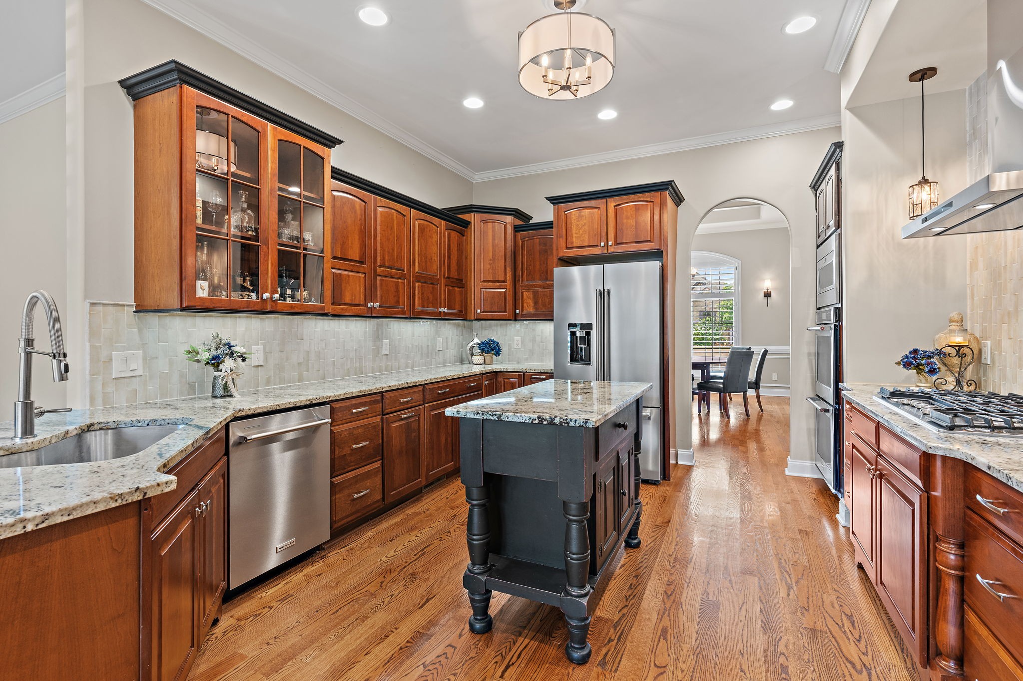 618 Ridgecrest Lane Lebanon, TN 37087 - Photo 11 of 75 a kitchen with stainless steel appliances granite countertop a lot of counter space and wooden floors