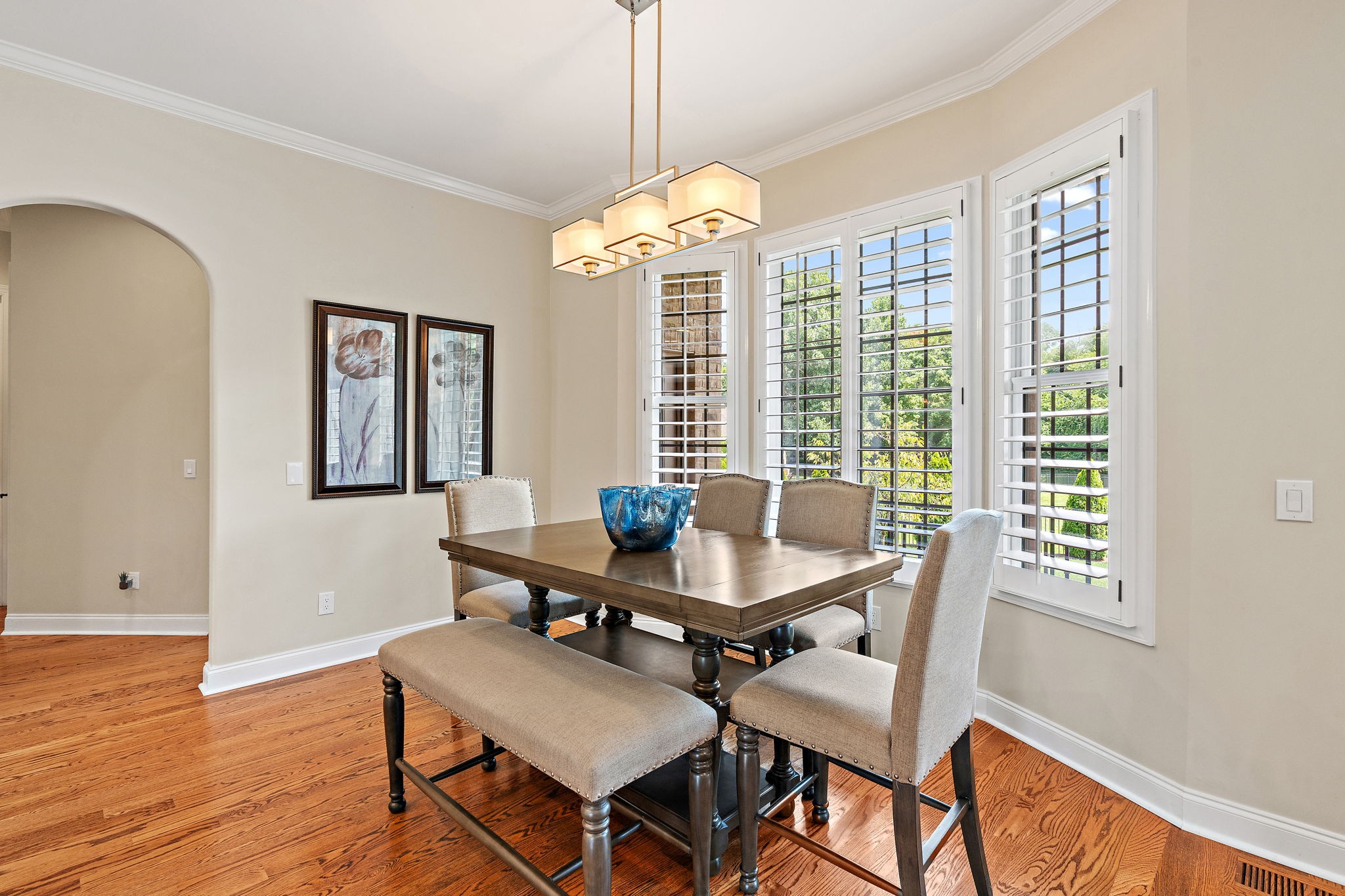 618 Ridgecrest Lane Lebanon, TN 37087 - Photo 14 of 75 a dining room with furniture a chandelier and wooden floor