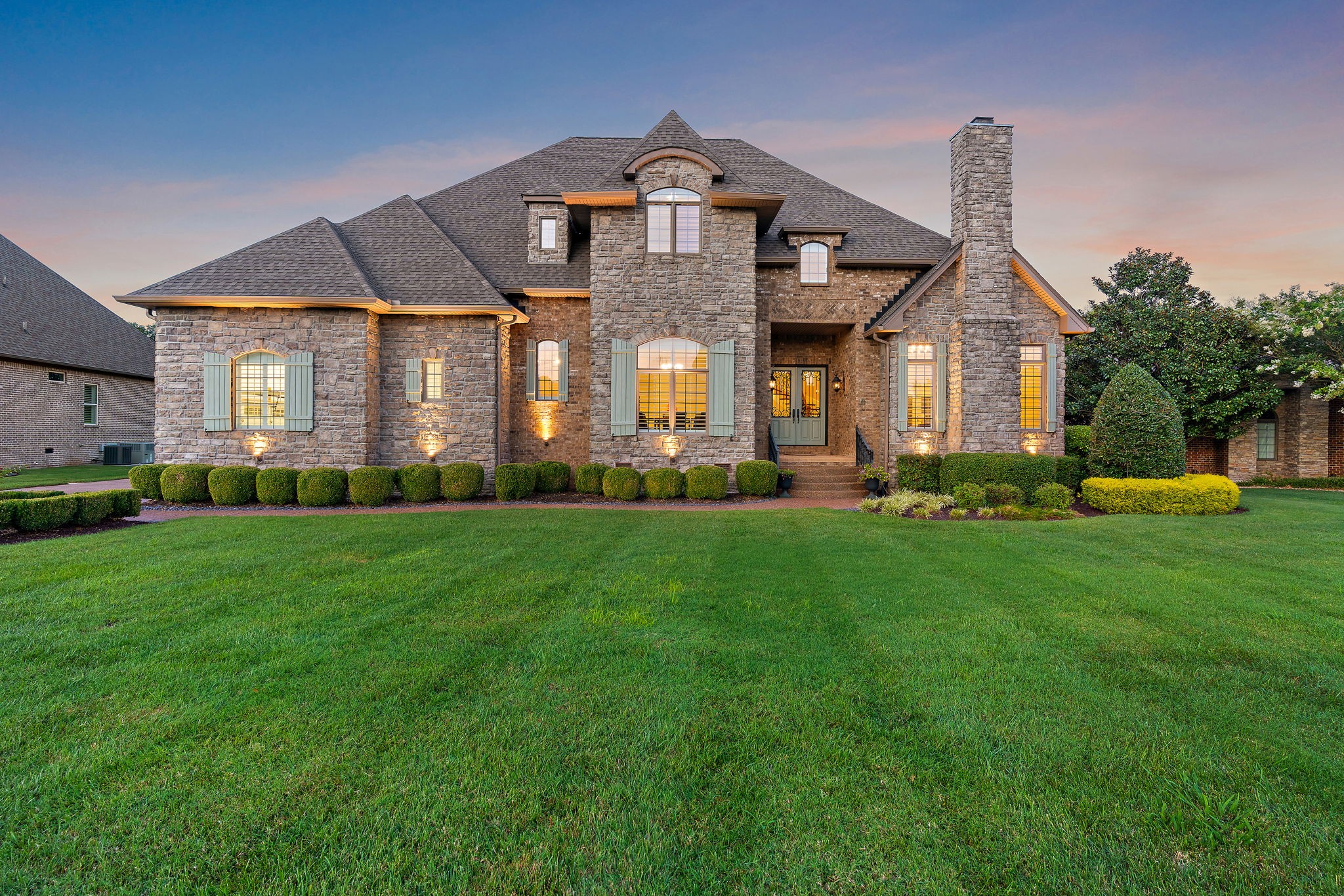 618 Ridgecrest Lane Lebanon, TN 37087 - Photo 2 of 75 a front view of a house with a large garden and plants