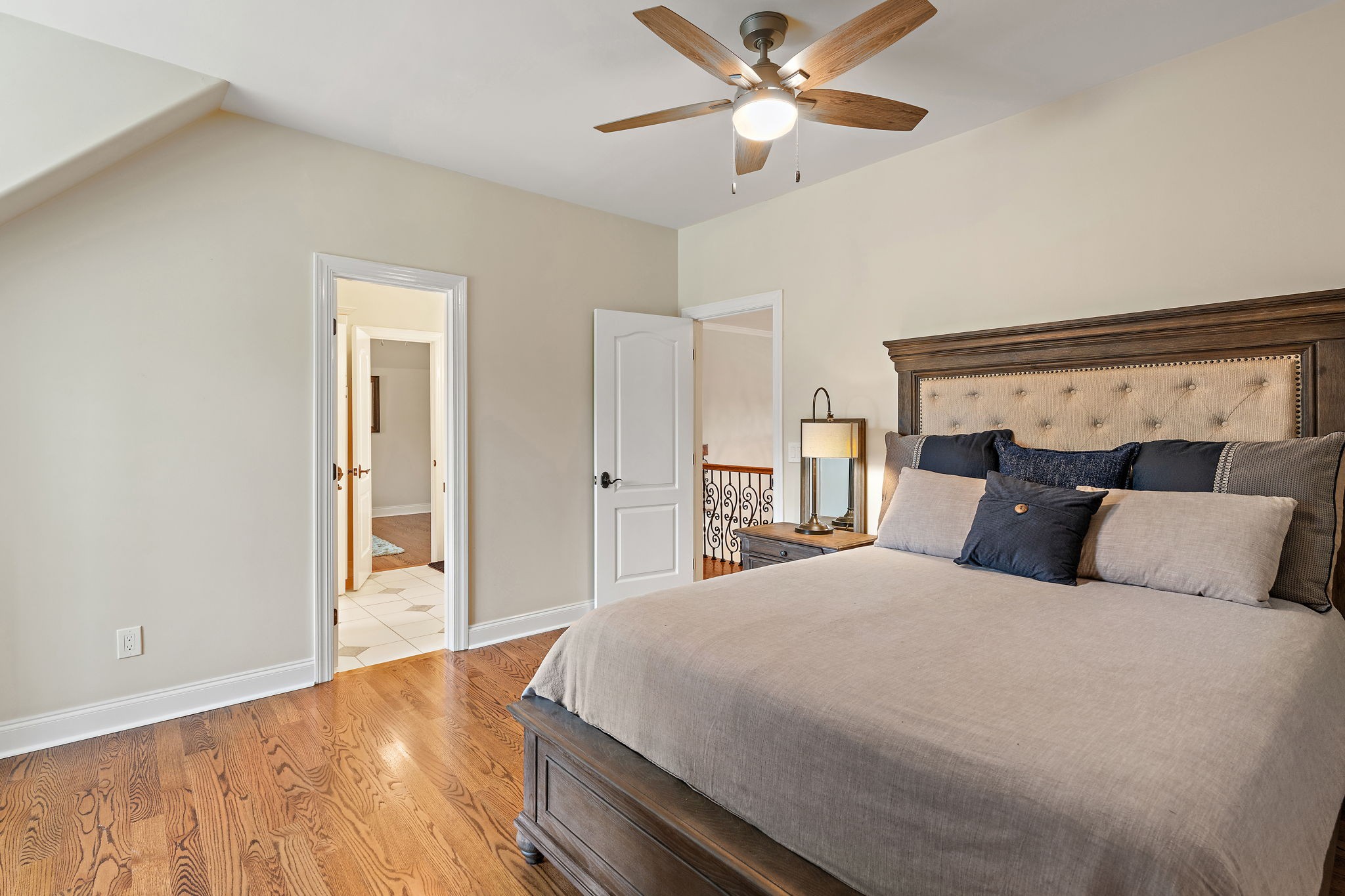 618 Ridgecrest Lane Lebanon, TN 37087 - Photo 43 of 75 a bedroom with a large bed and a chandelier