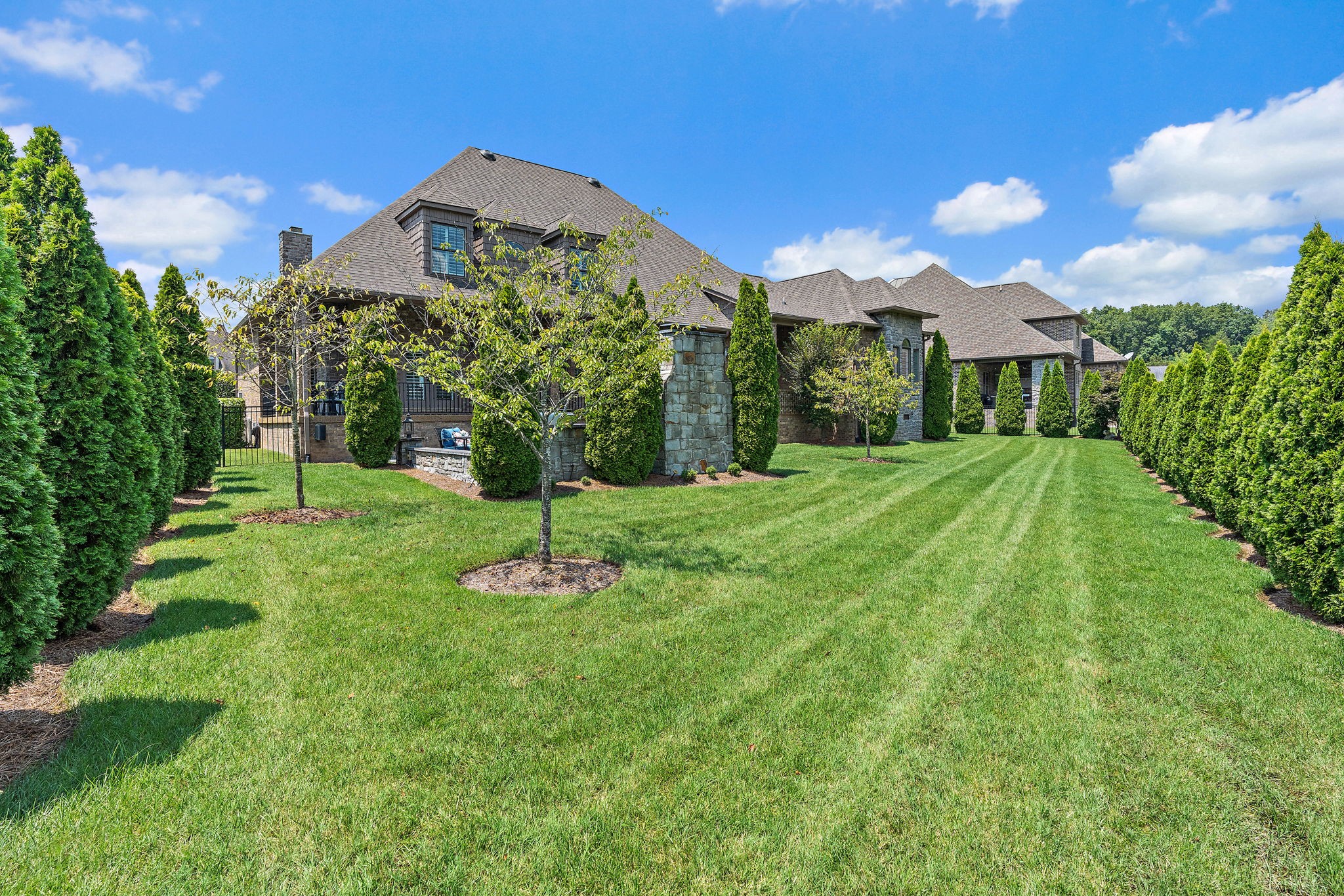 618 Ridgecrest Lane Lebanon, TN 37087 - Photo 61 of 75 a view of a garden with a building in the background