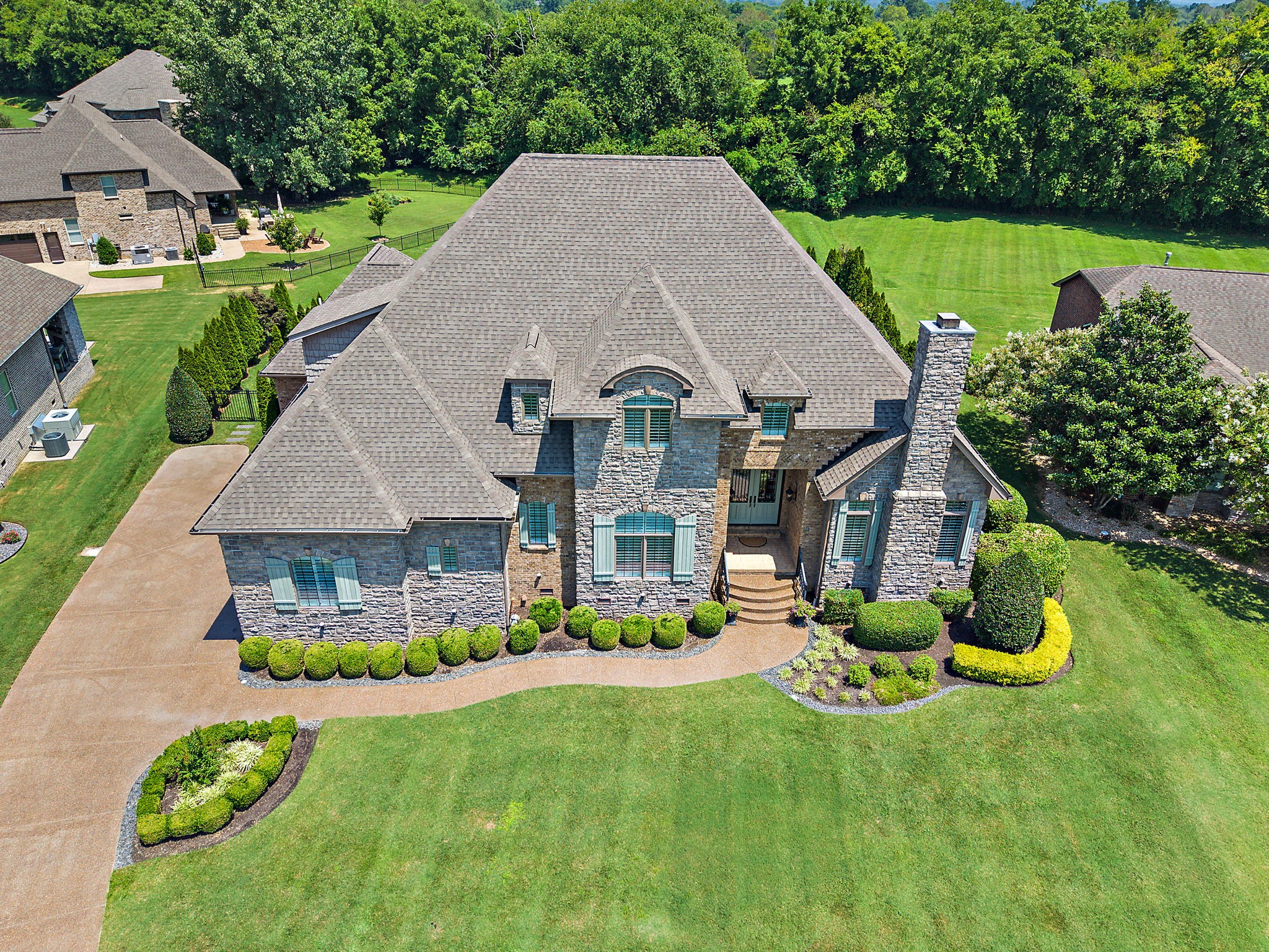 618 Ridgecrest Lane Lebanon, TN 37087 - Photo 65 of 75 a aerial view of a house with swimming pool next to a big yard