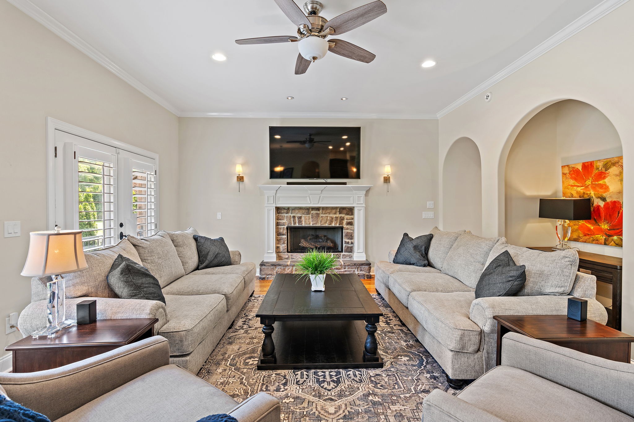 618 Ridgecrest Lane Lebanon, TN 37087 - Photo 10 of 75 a living room with furniture a flat screen tv and a fireplace