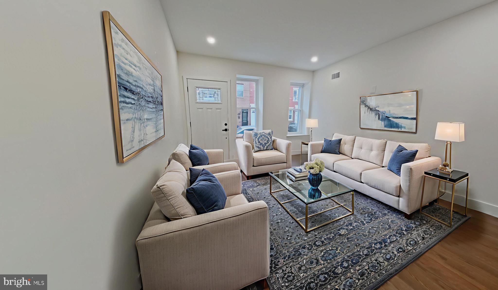 1307 North Randolph Street Philadelphia, PA 19122 - Photo 9 of 43 a living room with furniture and a rug