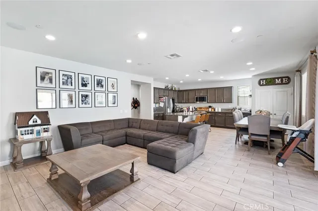 a living room with furniture and a table