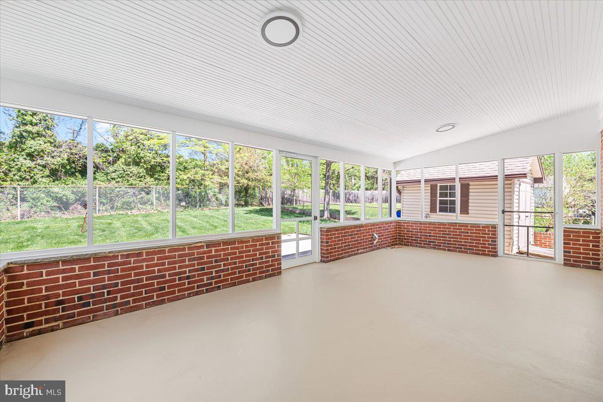 9619 Singleton Drive Bethesda, MD 20817 - Photo 16 of 25 a view of an empty room and window