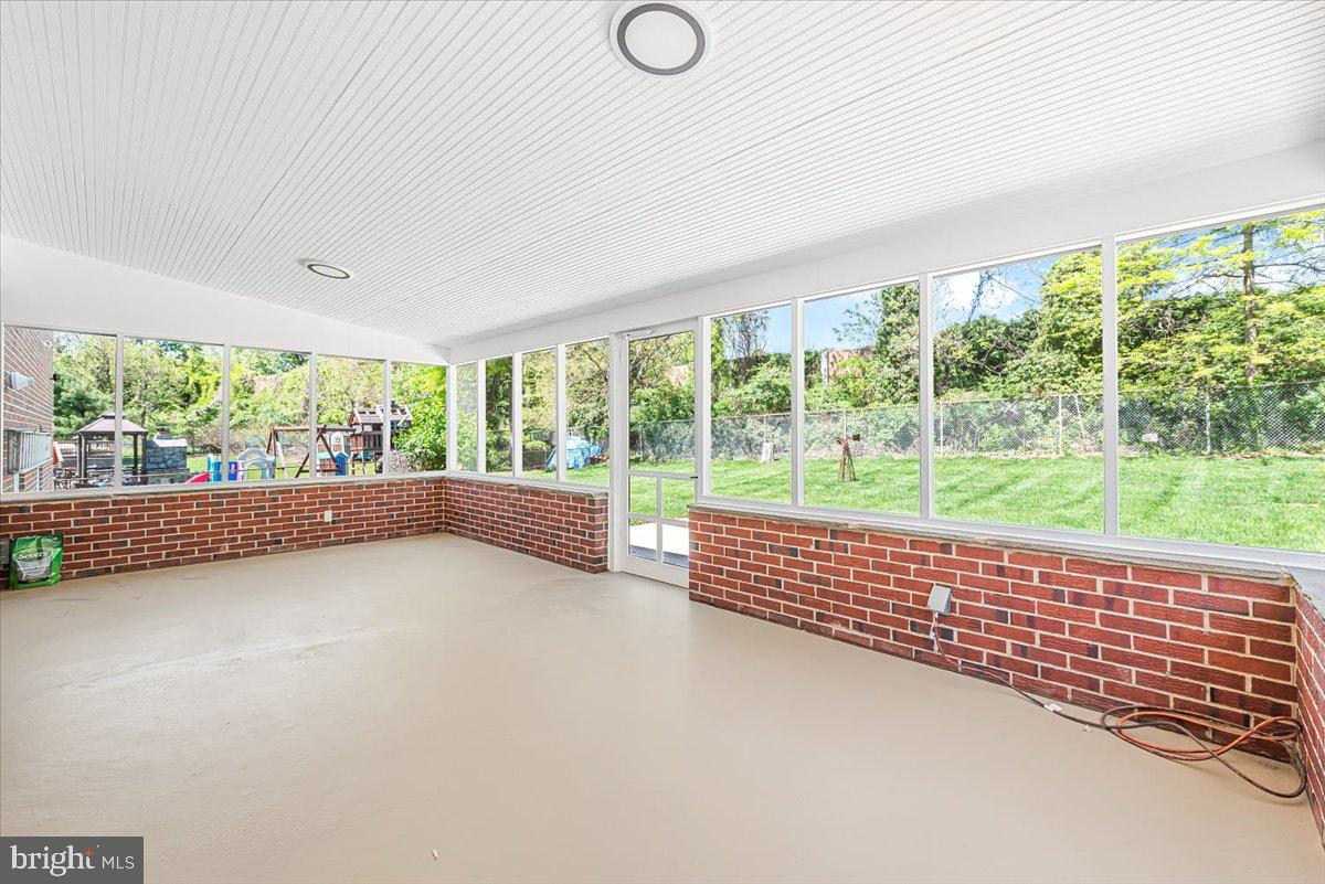 9619 Singleton Drive Bethesda, MD 20817 - Photo 17 of 25 a view of room with window and pool
