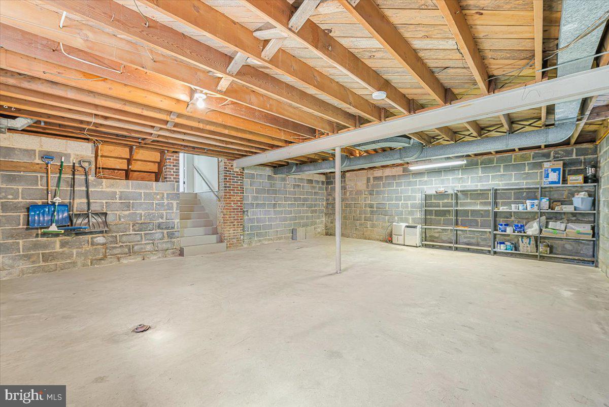 9619 Singleton Drive Bethesda, MD 20817 - Photo 24 of 25 a view of an empty room with white walls