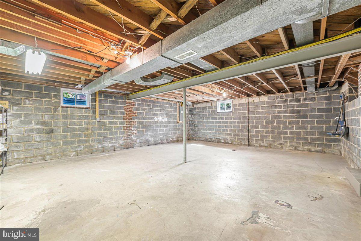 9619 Singleton Drive Bethesda, MD 20817 - Photo 25 of 25 a view of empty room with wooden ceiling