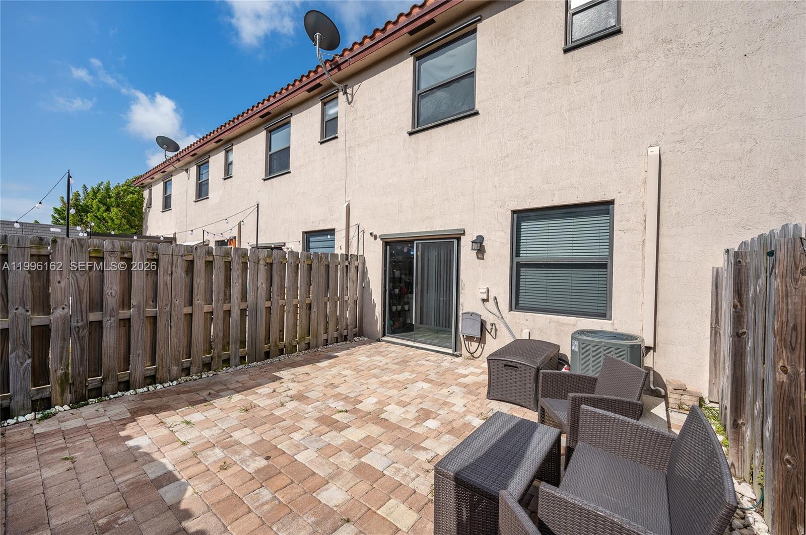 24951 Southwest 114th Court Homestead, FL 33032 - Photo 21 of 28 a view of a patio with wooden floor