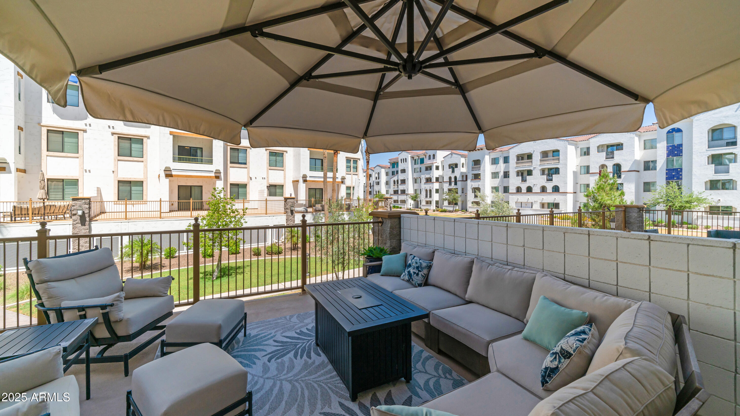2511 West Queen Creek Road, Unit 166 Chandler, AZ 85248 - Photo 25 of 66 a balcony with furniture and a couch