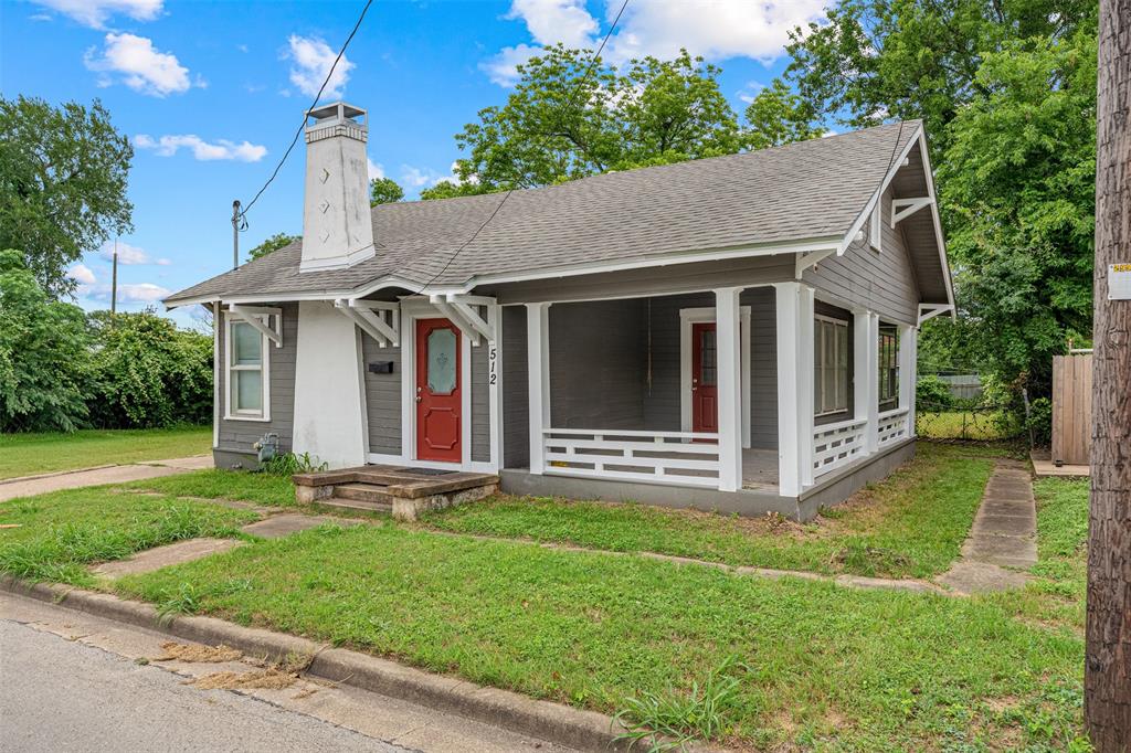 512 Herring Avenue Waco, TX 76708 - Photo 25 of 32 a front view of house with yard and green space