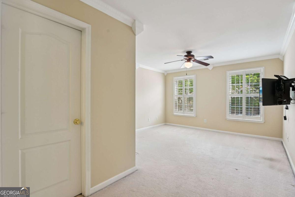 3180 The Commons Drive Cumming, GA 30041 - Photo 44 of 84 a view of an empty room with a window